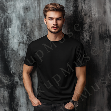 Men’s black Gildan 5000 crewneck t-shirt mockup — studio editorial, gray textured wall, front view