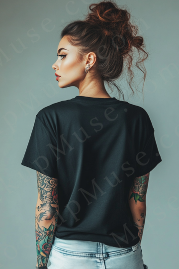 Vertical 2:3 women’s black onyx Gildan 5000 t‑shirt mockup, back view on light gray studio with tattooed arms visible; clean apparel template for online stores.